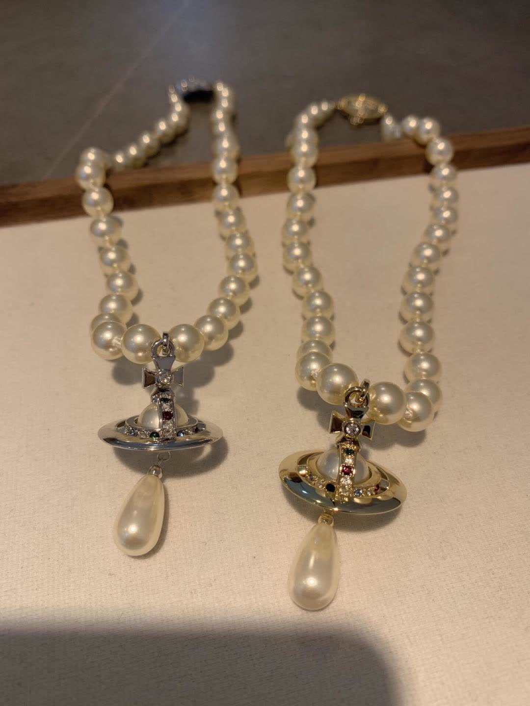 Vivienne Westwood Elegant Pearl Necklace with Pendant